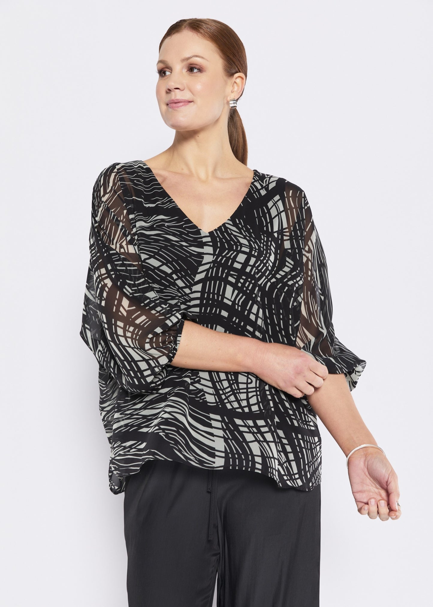 Philosophy Momentum Crest Top in Black/Vanilla