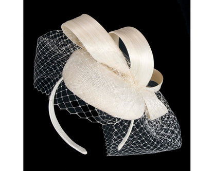 Cream Racing Pillbox Fascinator with Face Veil